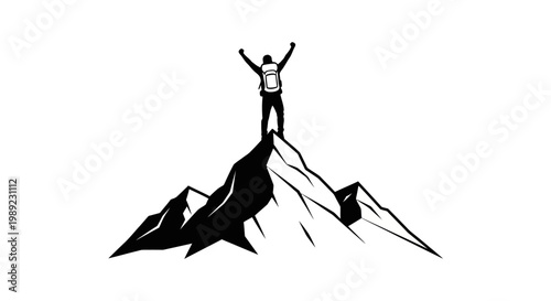 Man standing on mountain peak triumphantly.
