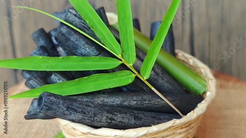 Bamboo charcoal and bamboo leaves in a basket