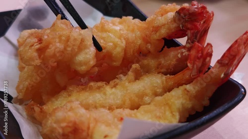 shrimp tempura japanese food isolated on a black bowl