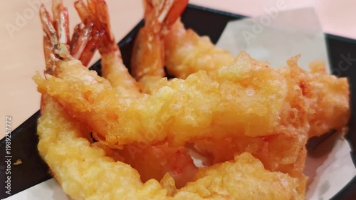 shrimp tempura japanese food isolated on a black bowl