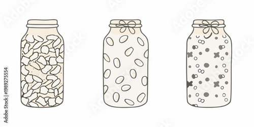 Three decorative glass bottles filled with various speckled contents