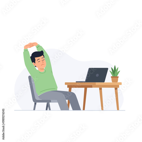 Man sitting at desk stretches with laptop and plant nearby indoors