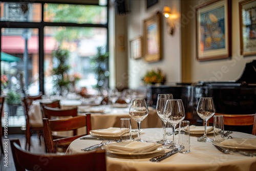 Elegant Restaurant Dining Table Setting with Wine Glasses and Plates.