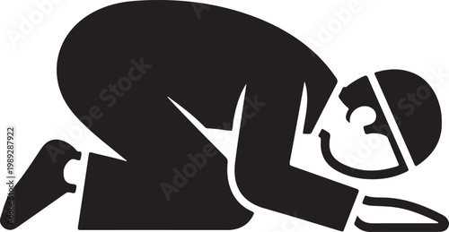 Man kneeling in prayer, head to ground, silhouette black