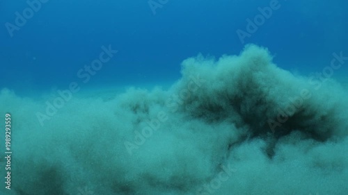 sand underwater moving making shapes  no gravity like sand storms and clouds