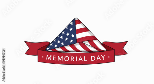A folded American flag draped with a red ribbon that says Memorial Day across it