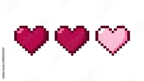 Photos Three pixelated hearts in shades of pink and red, isolated on transparent backgr