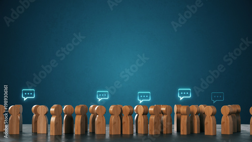 Communication concept with wooden human figures with speech bubbles