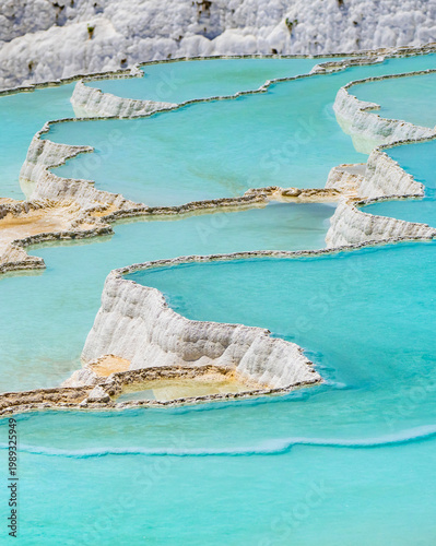 Pamukkale Travertines Drone Photo, An aerial view of the Pamukkale Travertines. Pamukkale Denizli, Turkiye (Turkey)