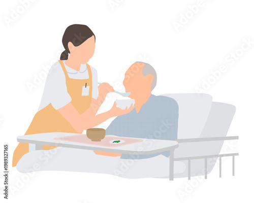 高齢男性の食事介助シーン／介護士・入院生活・介護サポート