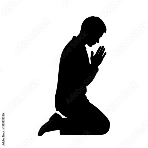 Man Kneeling in Prayer Position Silhouette.