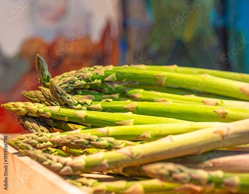 Fresh Green Asparagus Spears In Close Up Photography Displayed At A Local Farmer Market With Soft Blurred Background