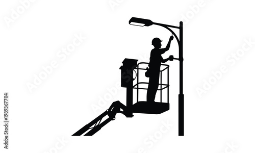 Construction worker on lift, repairing streetlight, silhouette, black and white, industrial scene, maintenance worker, worker on aerial lift