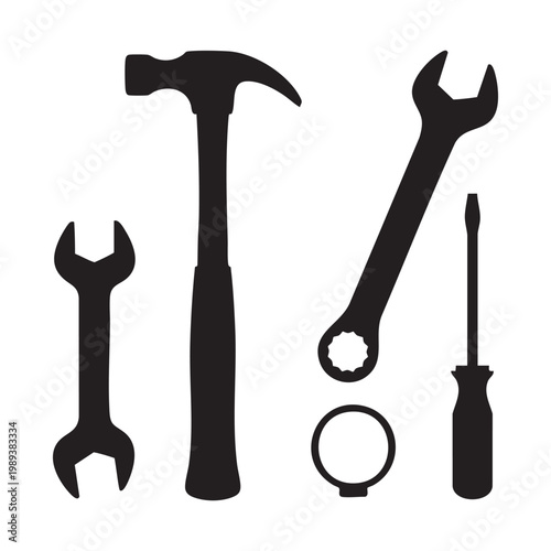 Silhouette of various tools on including wrench and hammer