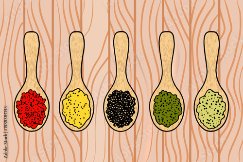 Five wooden spoons filled with colorful spices against a woodgrain background