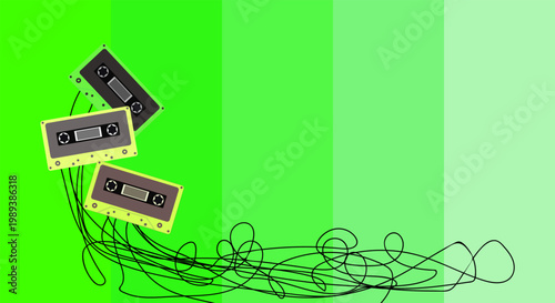 Vintage cassette tapes on green background with tangled ribbons