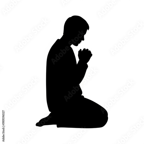 Man Kneeling in Prayer Silhouette.