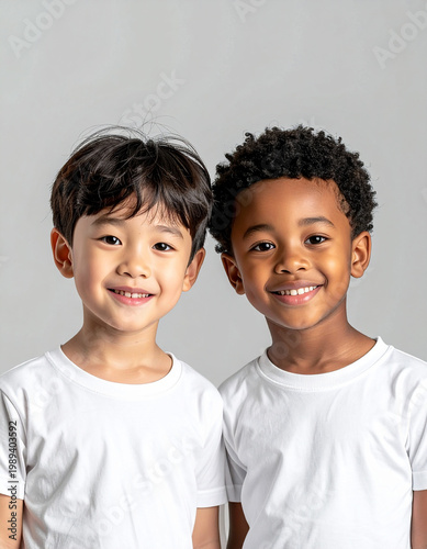  Two smiling children facing camera, happy expression