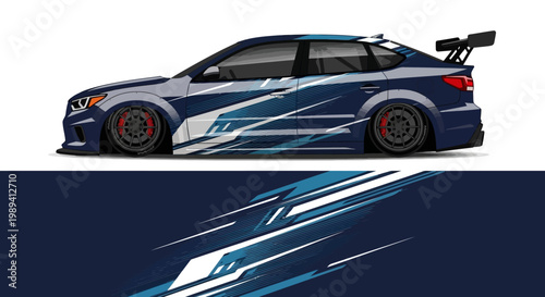 Blue racing car with dynamic white graphic livery and sleek aerodynamic design on a racing track.