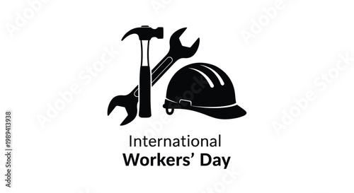 Construction tools and helmet with international workers day text