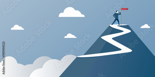 A businessman reaches the summit planting a flag on a mountain peak