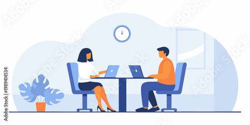 Two professionals collaborate during a meeting in a modern office space
