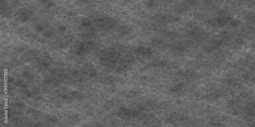 Abstract dark gray grunge texture background with subtle noise grain and soft distressed surface