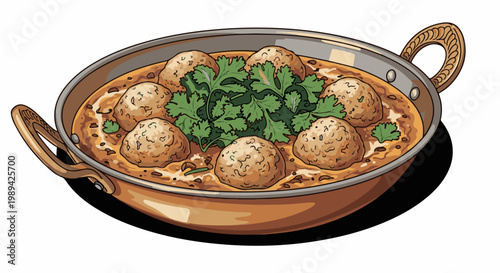 Delicious curry with meatballs and fresh cilantro garnish served in a pan