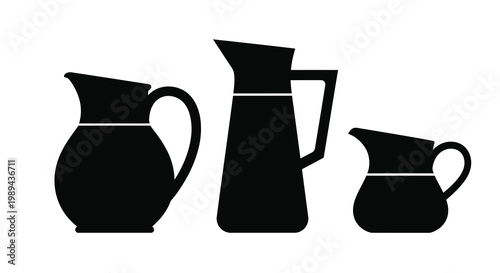 Three black pitchers and a creamer are arranged in a simple silhouette