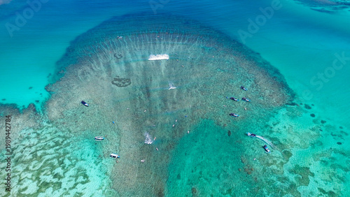 Aerial View of Boats on Clear Ocean Water Tnjung Aan beach, Lombok Indonesia