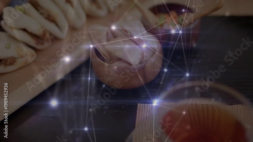 Camera panning and overlay drifting revealing glass teacup, centering amber tea from baos for menu