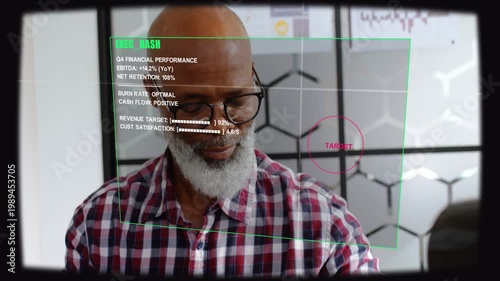 Shot revealing man monitoring finance HUD, typing laptop and checking watch, HUD tracking hands
