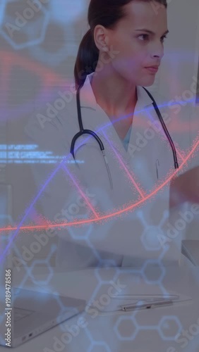 Vertical video: Doctor tapping tablet as medical overlays sweeping across view, revealing DNA helix