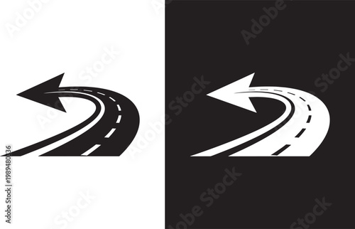 A black and white road with an arrow turning