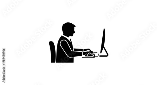 Man sitting at computer desk working.