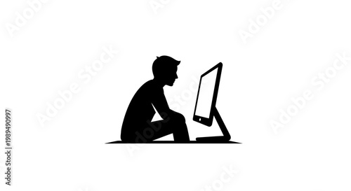 Man sitting on floor with computer.