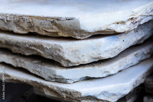 Φωτογραφία Background. Close-up. A stack of used marble slabs