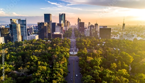 Aerial View Of Mexico City Skyline At Sunset Paseo De La Reforma And Chapultepec Park With Modern Skyscrapers And Golden Evening Light