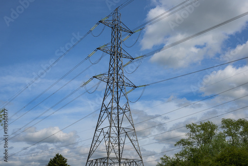 Electricity Pylon Against Blue Sky Power Infrastructure UK