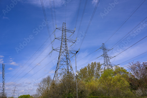 Electricity Pylons Against Blue Sky Power Infrastructure UK