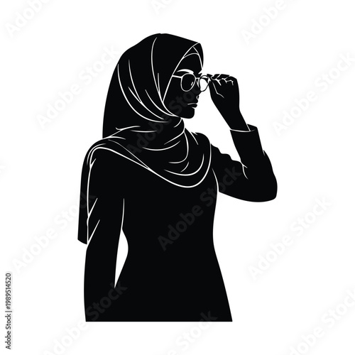 Muslim woman wearing glasses and hijab adjusting eyewear