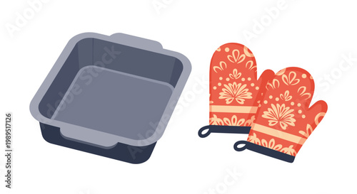 Square dark grey baking pan placed next to a pair of red kitchen oven mitts featuring a white floral pattern for cooking.