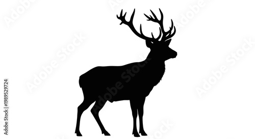 Silhouette of a majestic stag with large branched antlers