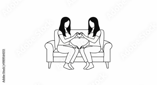 Two women sit on a sofa forming a heart shape with their hands