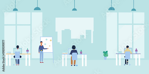 Modern office space with employees collaborating and working at desks