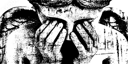 Stone angel statue covering face on monument closeup