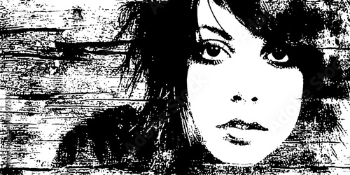 Female face staring in high contrast grunge wood backdrop