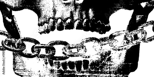 Human skull with chained jaw on distressed white surface