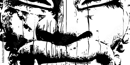 Carved tiki mouth and nose displaying worn wooden surface