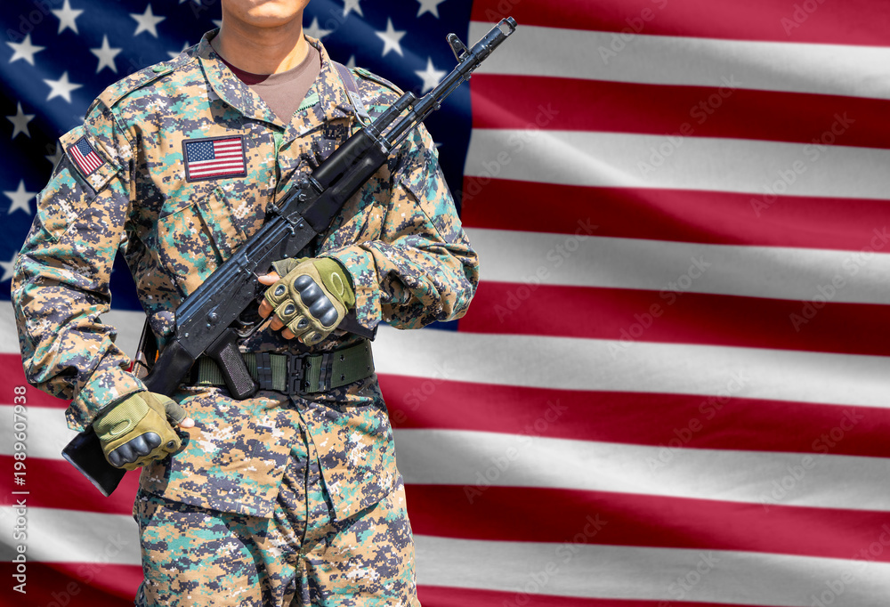 Obraz premium United States of America flag with soldier holding assault rifle